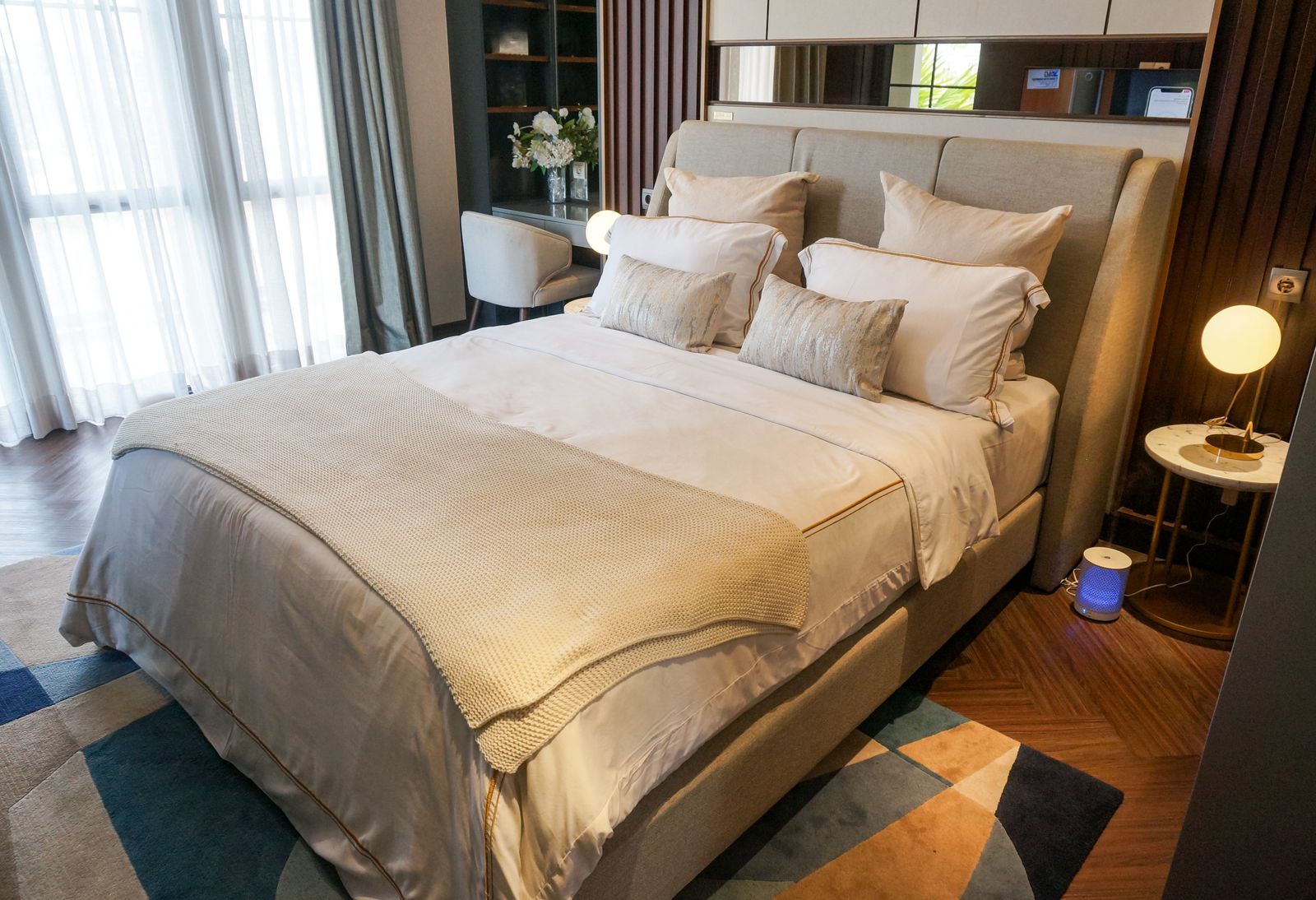 An inviting real bedroom with pillows arranged for everyday sleep