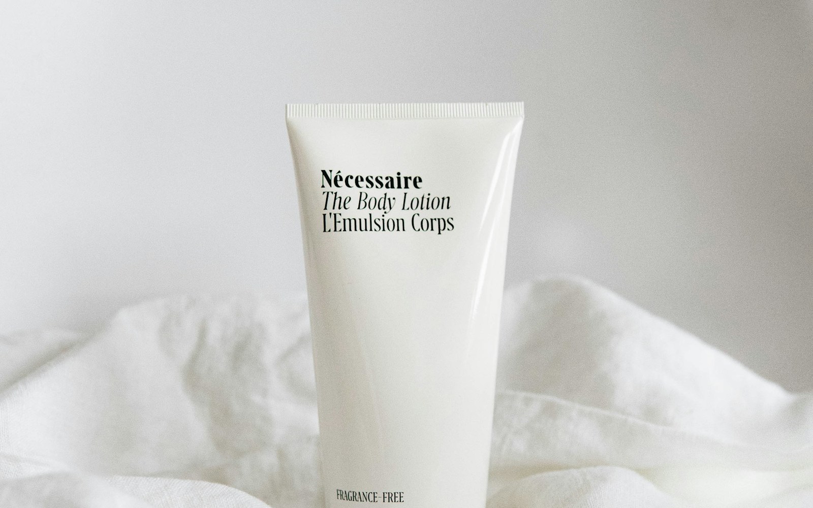 A niacinamide serum beside a simple daily skincare setup
